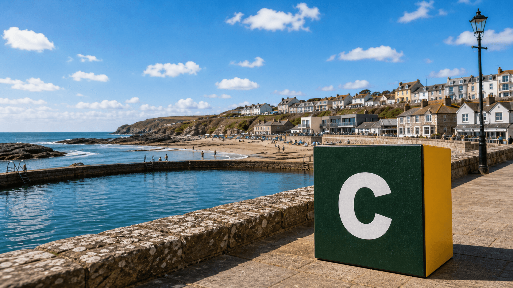 AI training in Bude with a realistic Coaley Peak branded 3D cube at Bude Sea Pool and Summerleaze Beach