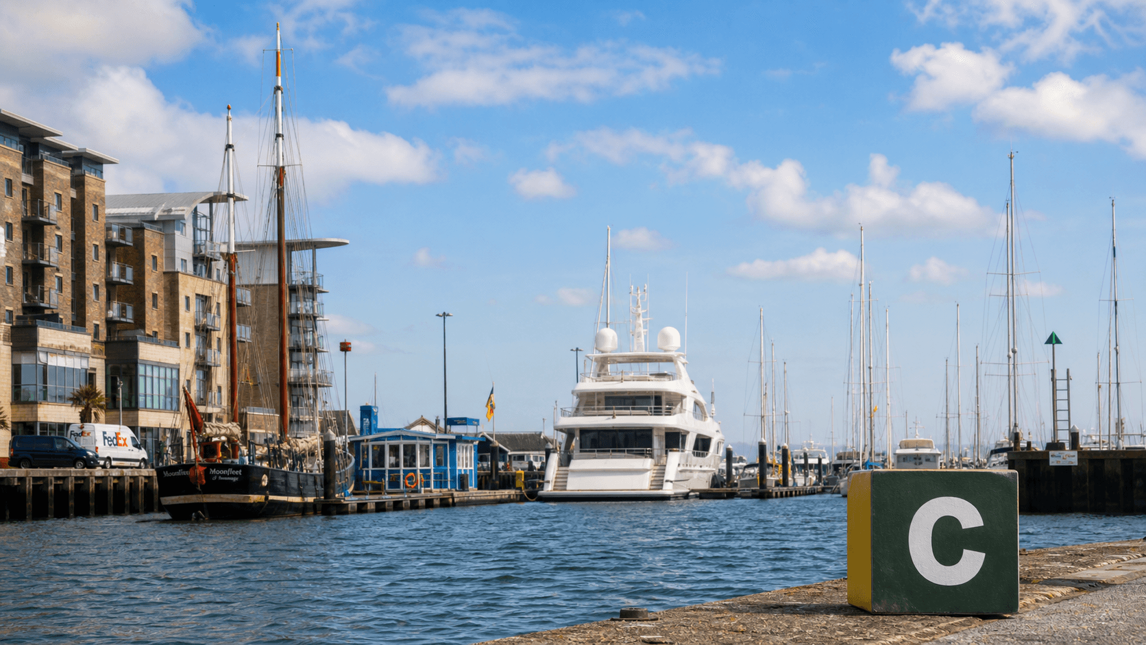 AI training in Poole with a realistic Coaley Peak branded 3D cube at Poole Quay