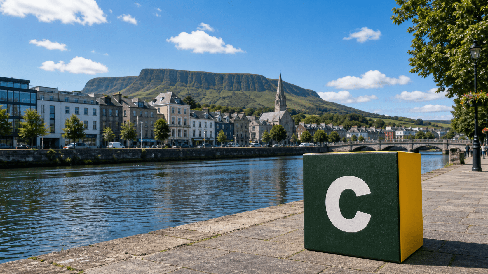 AI training in Sligo with a realistic Coaley Peak branded 3D cube at Sligo riverfront and Benbulben