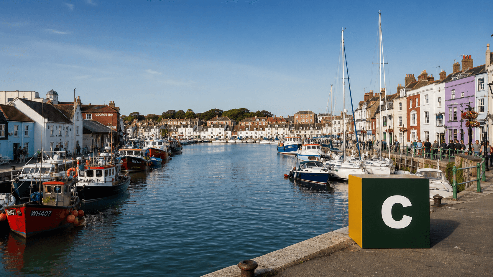 AI training in Weymouth with a realistic Coaley Peak branded 3D cube at Weymouth Harbour
