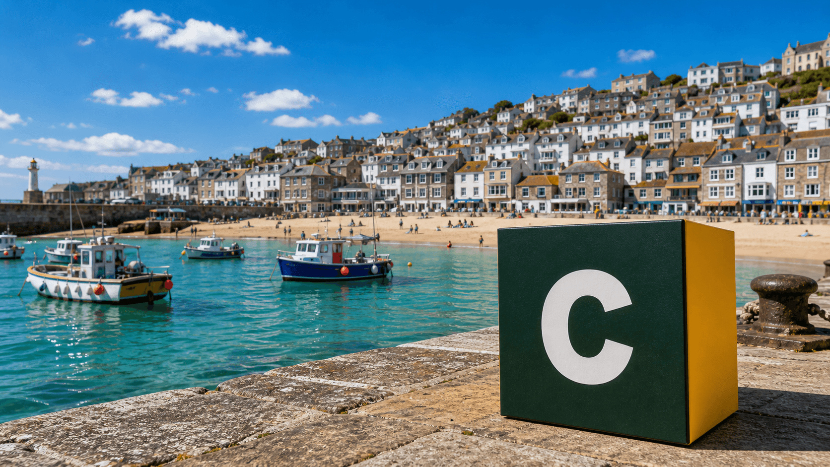 AI training in St Ives by Coaley Peak AI training in St Ives with a realistic Coaley Peak branded 3D cube at St Ives harbour