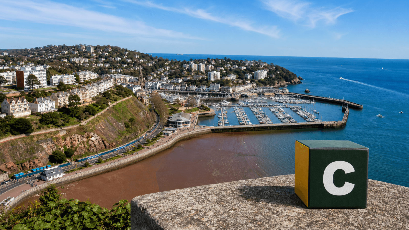 AI training in Torquay by Coaley Peak AI training in Torquay with a realistic Coaley Peak branded 3D cube at Torquay Harbour